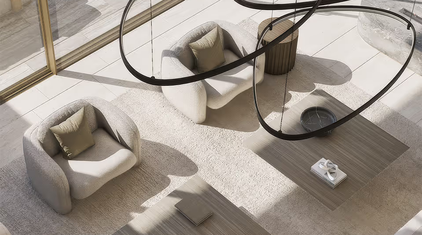 Sunlit interior seating arrangement showing sculptural lighting, layered texture, and spatial composition